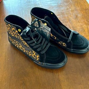 Brand new women’s size 11 men’s size 9 cheetah print vans
